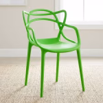 White bistro plastic chair with modern design and stackable build