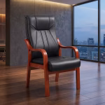 Black leather visitors office chair with cushioned seat and chrome frame