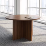 Round wooden conference table with polished finish