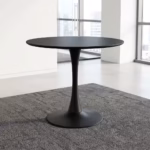 Modern Home Office Round Eames Dining Table with round matte tabletop and tulip pedestal base in black and white finishes.