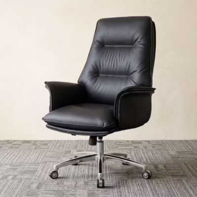 Executive leather office chair with black padded upholstery, high backrest, wide armrests, chrome base, and caster wheels.