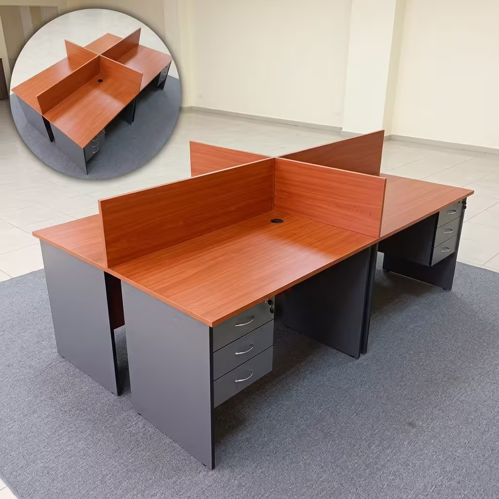 Customized 4 way workstation with privacy partitions, drawer pedestals, cable management ports, and four individual workspaces.