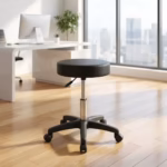 Swivel leather barstool with padded black seat, height adjustment lever, chrome gas lift, five-star base, and caster wheels.