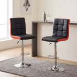 Height adjustable barstool with black and red padded leather seat, chrome pedestal base, swivel function, and footrest.