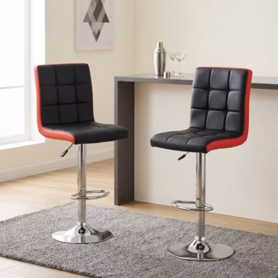 Height adjustable barstool with black and red padded leather seat, chrome pedestal base, swivel function, and footrest.